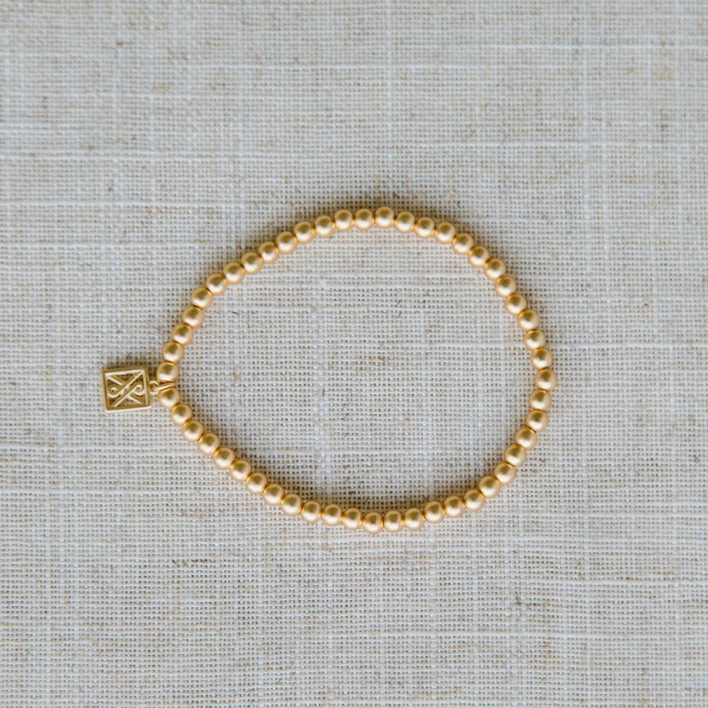 Kinsley Stretch Beaded Matte Gold Bracelet by Michelle McDowell